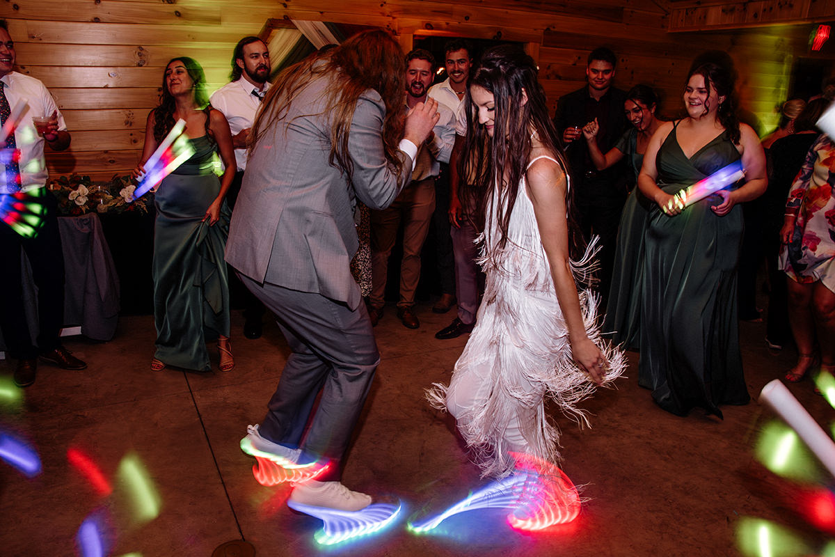 The Haven at Cedar Grove Hocking Hills Ohio Wedding Venue Reception Dance Party Light-up sneakers DJ Chappelle Roan Pink Party Club