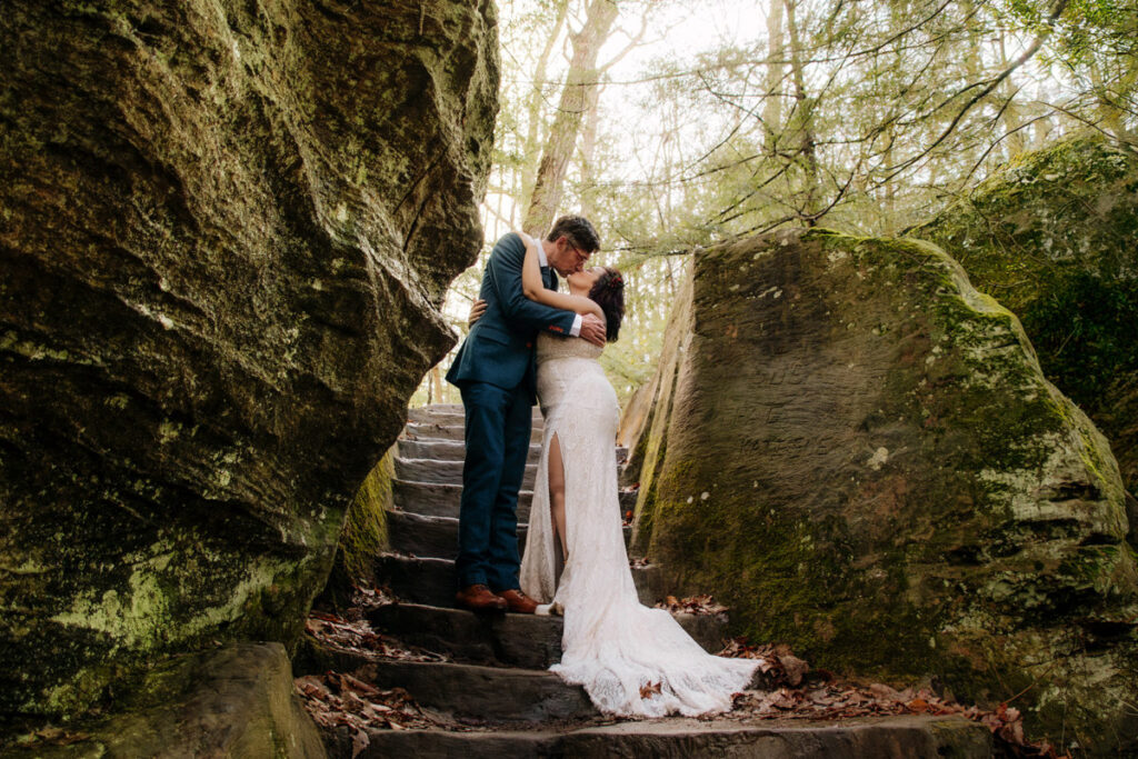 The Rockhouse, with its tunnel-like cave and captivating 'window' views, provided a truly unique and breathtaking backdrop for their intimate Couples Portraits.