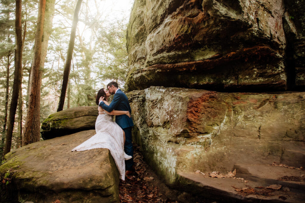 The Rockhouse, with its tunnel-like cave and captivating 'window' views, provided a truly unique and breathtaking backdrop for their intimate Couples Portraits.