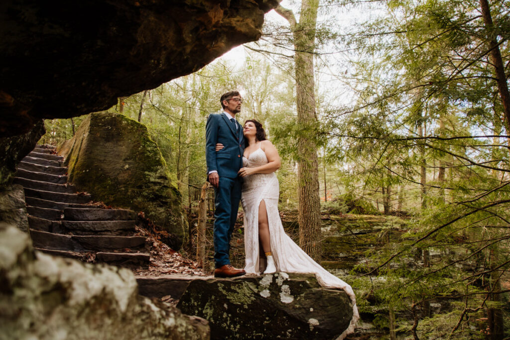 The Rockhouse, with its tunnel-like cave and captivating 'window' views, provided a truly unique and breathtaking backdrop for their intimate Couples Portraits.