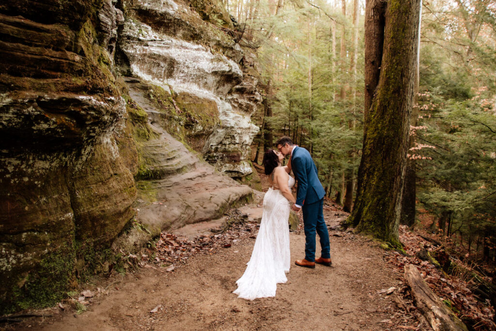 The Rockhouse, with its tunnel-like cave and captivating 'window' views, provided a truly unique and breathtaking backdrop for their intimate Couples Portraits.