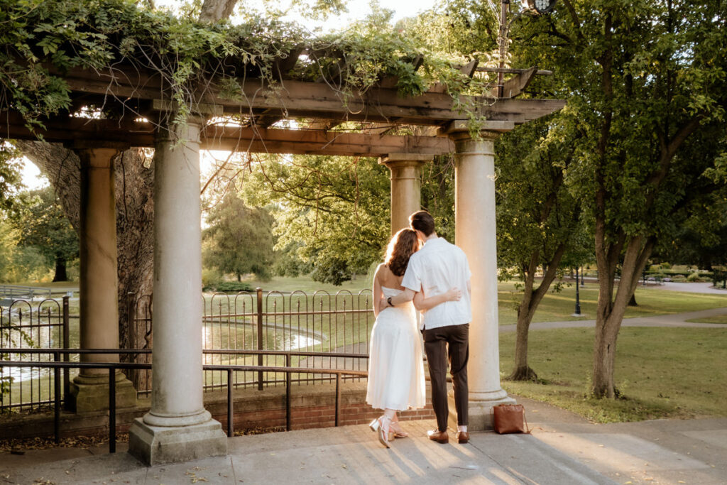 Schiller Park Columbus Ohio Engagement Photos Elizabeth Nihiser Photography Romantic Comedy Central Park Cute Whimsical Fun Love Joy Happy Beautiful Artistic Film Motion Blur Classic Modern Golden Hour Dress Outfit Inspo Inspiration Pinterest Travel Best Ring