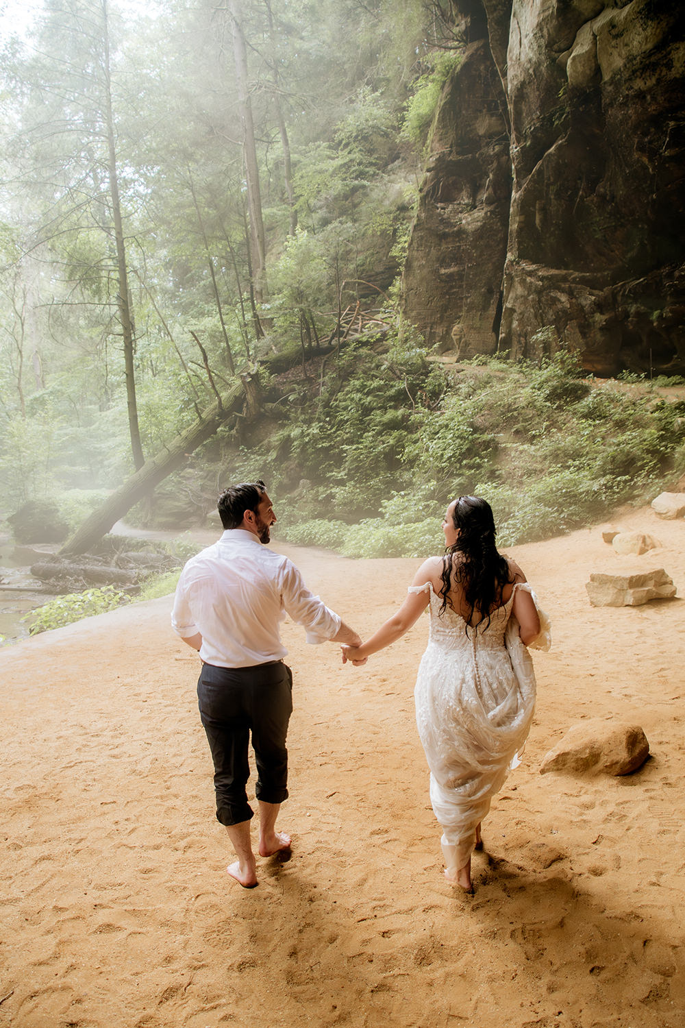 Ash Cave summer micro wedding ceremony with waterfall, dog, bridal party, guests and reception at Among The Trees Lodge Cedar Falls Engagement Session