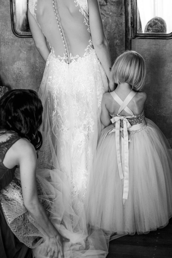 Texas Blum Stonebridge Wedding Venue of bride, bridesmaid, and flower girl getting ready for the aisle and ceremony.