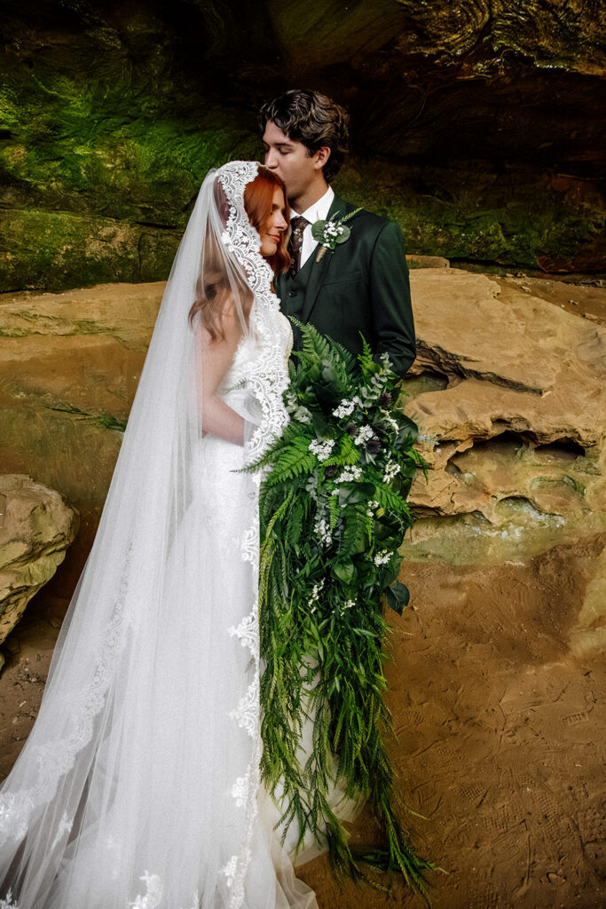 Classic portrait of a wedding couple sharing a moment after their Hocking Hills ceremony.