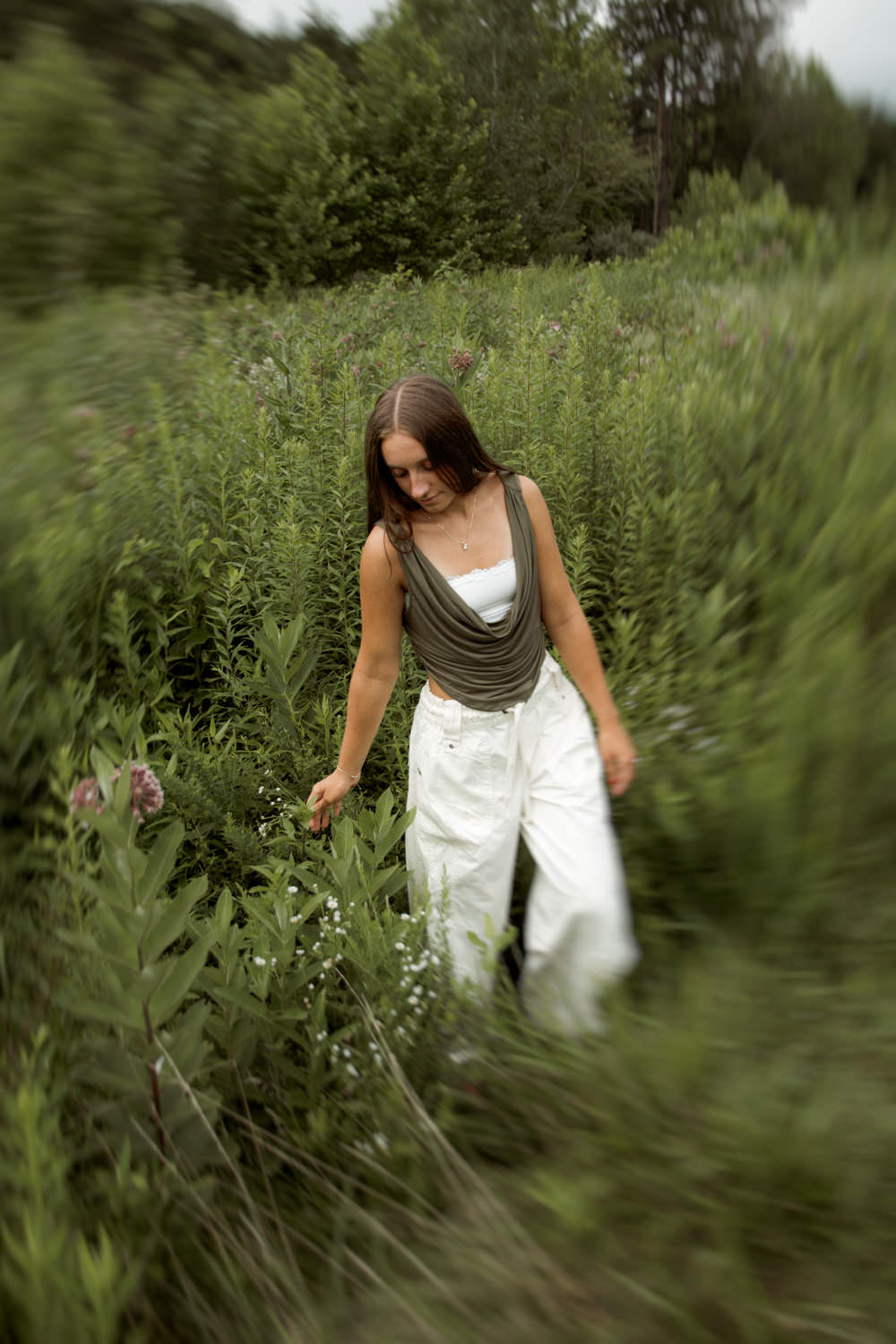 High school senior enjoying a morning hike during her adventurous senior portrait session.