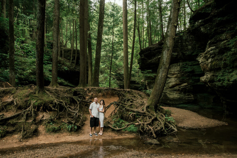 Hocking Hills Old Man's Cave Gorge Summer Engagement session with tall trees and moss.