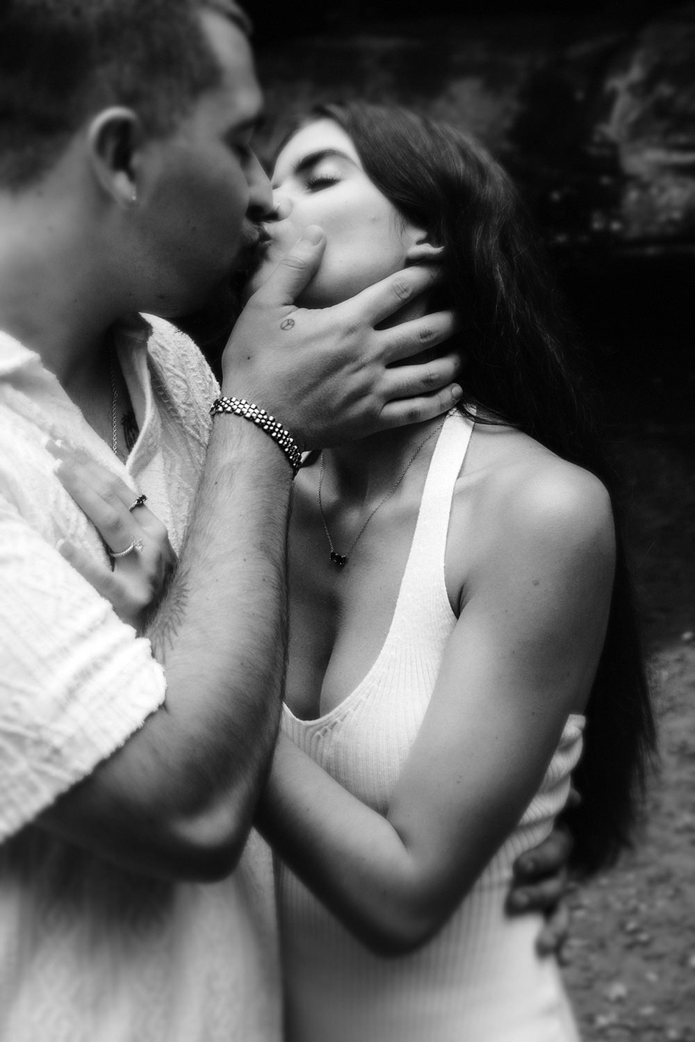 Black and white romantic engagement photo taken in the Hocking Hills.
