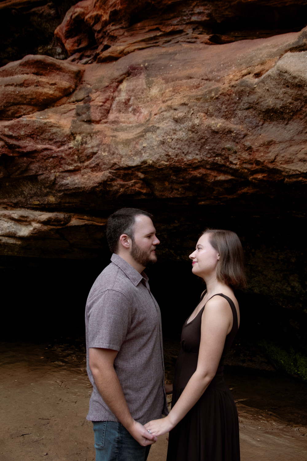 Couple sharing a quiet moment during their 10th anniversary photo session and hike.